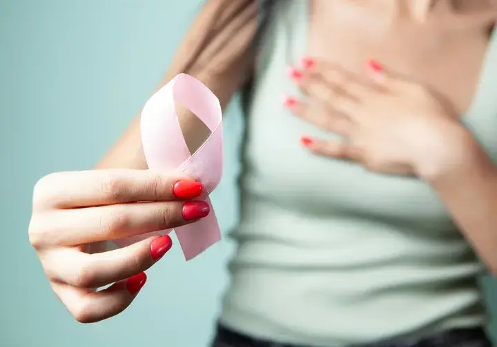 Parodontite e cancro al seno — connessione microbioma orale e tessuto mammario